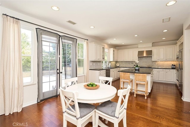 1472 Nicolas Way, Fullerton, CA 92833 - dining area featuring healthy amount of natural light, dark wood-style floors, recessed lighting, and french doors