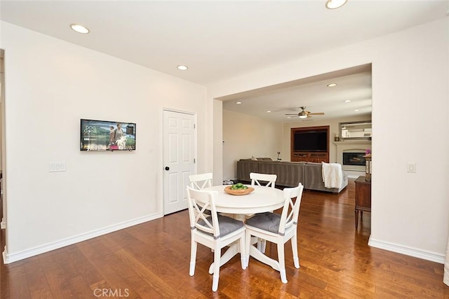 1472 Nicolas Way, Fullerton, CA 92833 - dining space with dark wood-style flooring, recessed lighting, ceiling fan, a fireplace, and baseboards