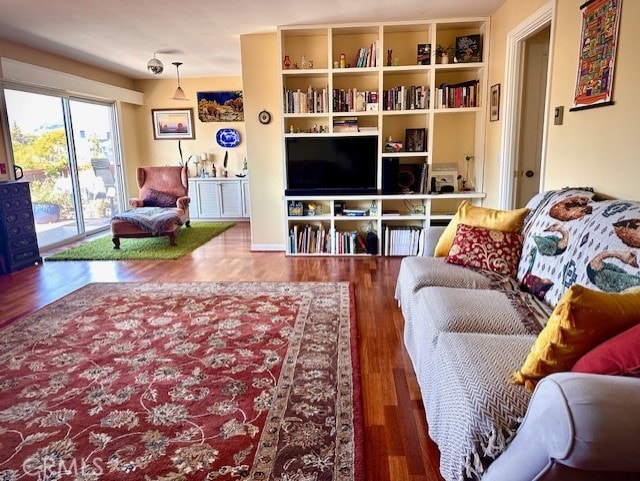 living room with wood finished floors