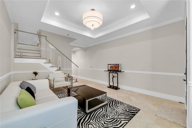 living room with stairs, recessed lighting, a tray ceiling, and crown molding