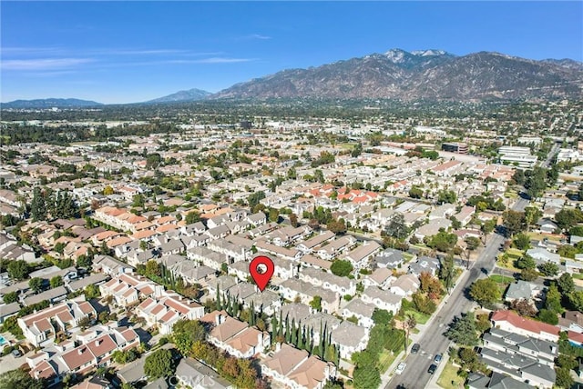 aerial view featuring a mountain view and a residential view