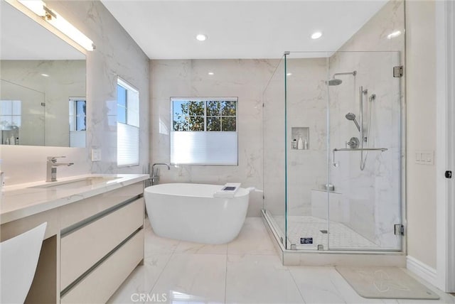 full bathroom featuring a marble finish shower, marble finish floor, and vanity