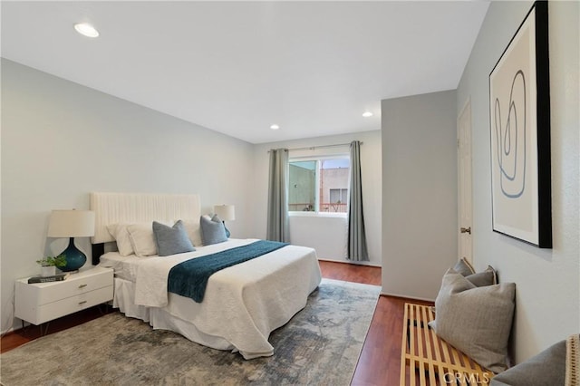 bedroom featuring recessed lighting and wood finished floors