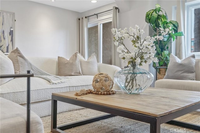 living area with a healthy amount of sunlight and recessed lighting
