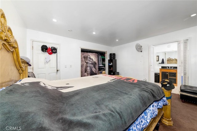 carpeted bedroom with recessed lighting