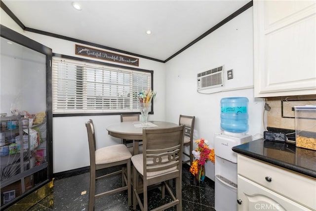 dining space featuring ornamental molding, an AC wall unit, granite finish floor, and recessed lighting