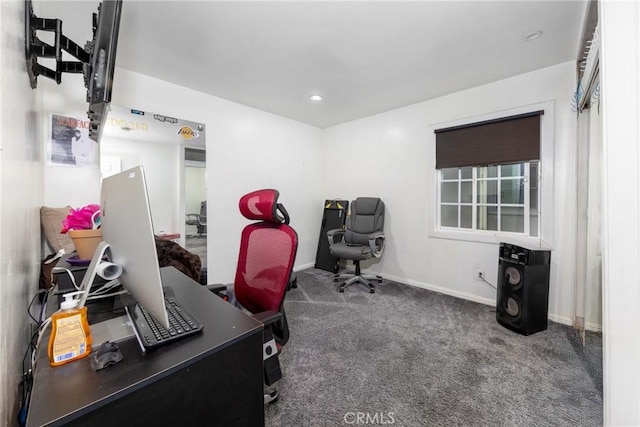 carpeted office with baseboards