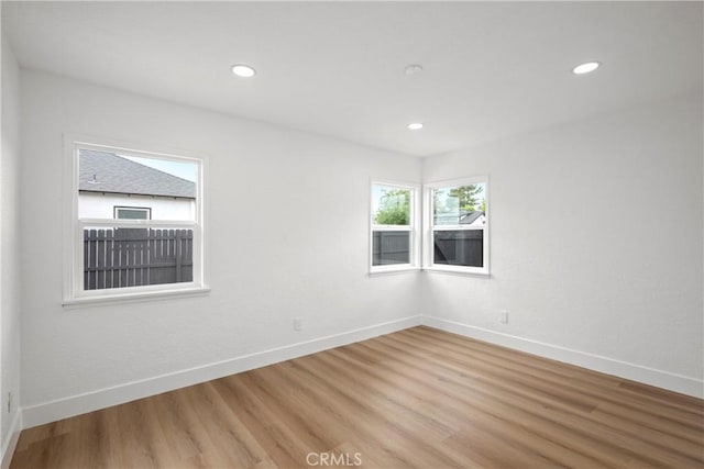 781 Sycamore Ct, Upland, CA 91786 - unfurnished room with light wood-type flooring, baseboards, and recessed lighting