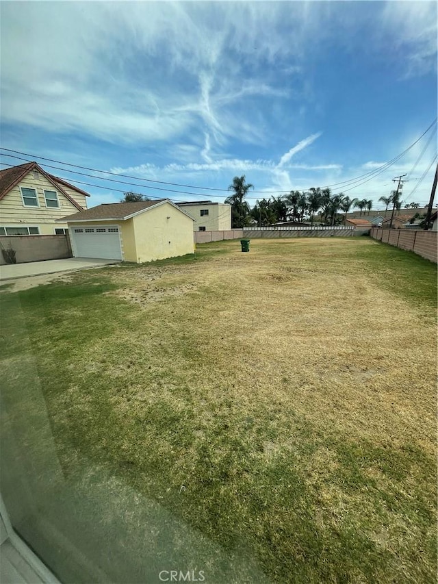 6526 Crossway Dr, Pico Rivera, CA 90660 - view of yard with fence and a garage
