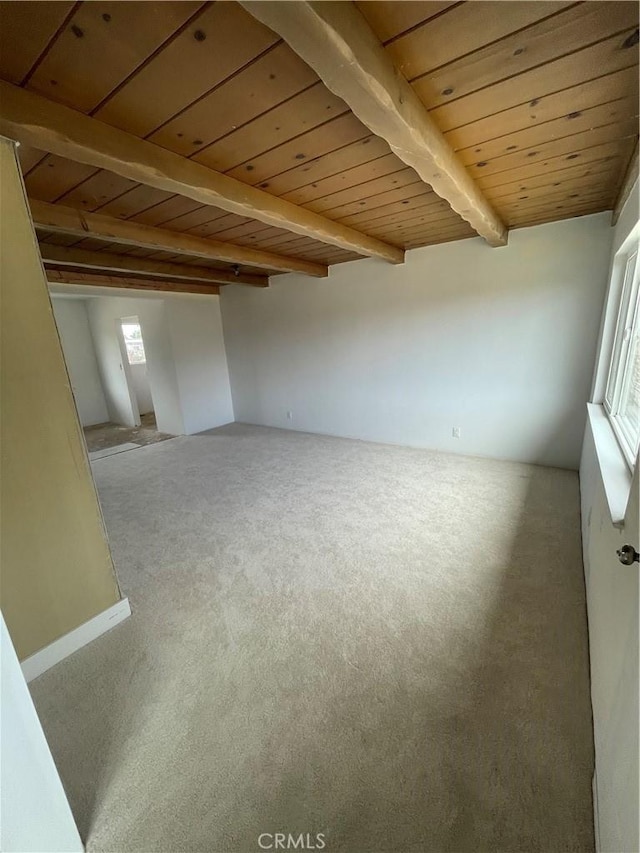 6526 Crossway Dr, Pico Rivera, CA 90660 - carpeted spare room featuring wood ceiling, beam ceiling, and healthy amount of natural light