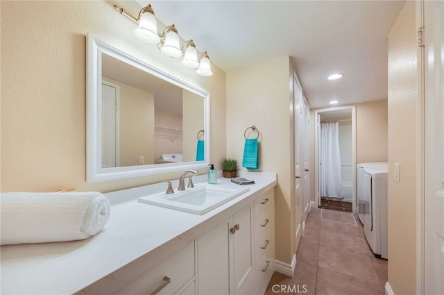bathroom with a shower with curtain, independent washer and dryer, vanity, recessed lighting, and tile patterned flooring