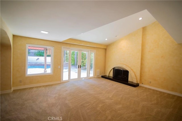 3926 Corte Cancion, Thousand Oaks, CA 91360 - unfurnished living room with carpet, baseboards, and a fireplace with raised hearth