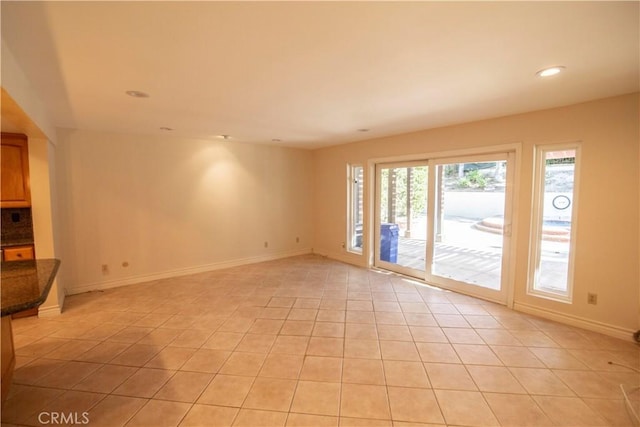 3926 Corte Cancion, Thousand Oaks, CA 91360 - unfurnished living room with light tile patterned flooring, baseboards, and recessed lighting