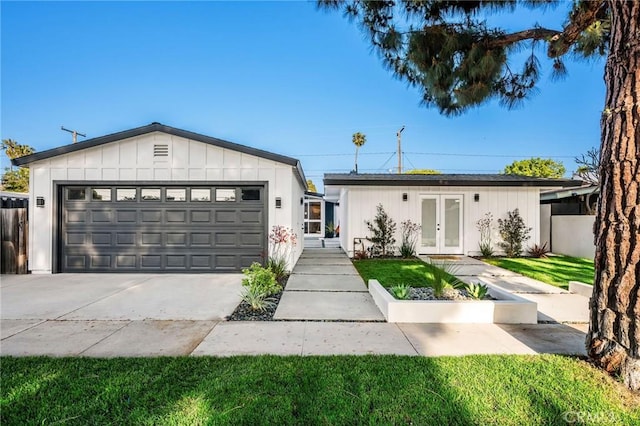 3130 Kallin Ave, Long Beach, CA 90808 - ranch-style house featuring french doors, a garage, driveway, and fence