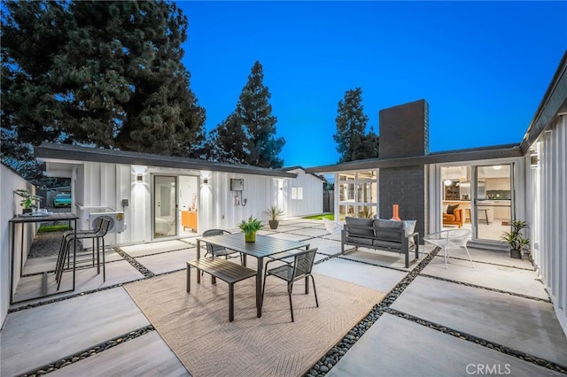 3130 Kallin Ave, Long Beach, CA 90808 - view of patio with an outdoor structure, outdoor dining space, and an outdoor hangout area