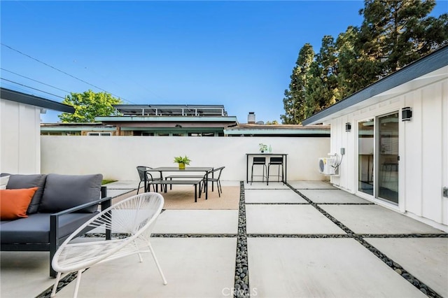 3130 Kallin Ave, Long Beach, CA 90808 - view of patio with outdoor dining area, outdoor lounge area, fence, and ac unit