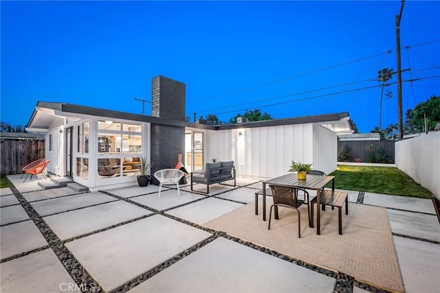 3130 Kallin Ave, Long Beach, CA 90808 - view of patio with a fenced backyard and outdoor dining area