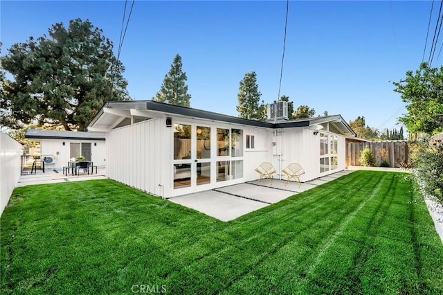 3130 Kallin Ave, Long Beach, CA 90808 - rear view of house with a patio and board and batten siding