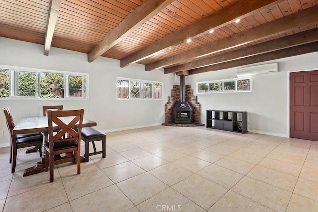 1229 Kilson Dr, Santa Ana, CA 92707 - tiled dining area with a wall mounted AC, wooden ceiling with exposed beams, a wood stove, and baseboards