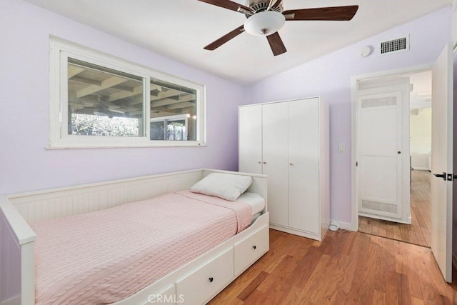1229 Kilson Dr, Santa Ana, CA 92707 - bedroom with a closet, light wood-style floors, a ceiling fan, and vaulted ceiling