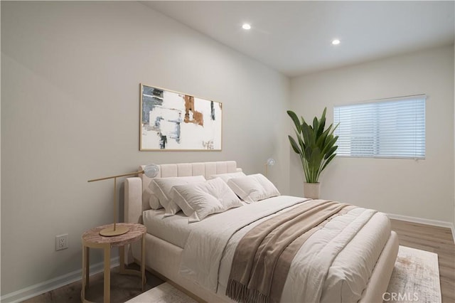 1271 S Sycamore Ave, Los Angeles, CA 90019 - bedroom with recessed lighting, baseboards, and wood finished floors