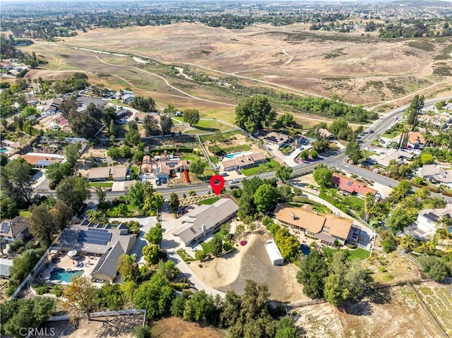 view of property location with nearby suburban area