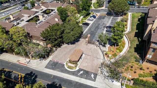 birds eye view of property with a residential view