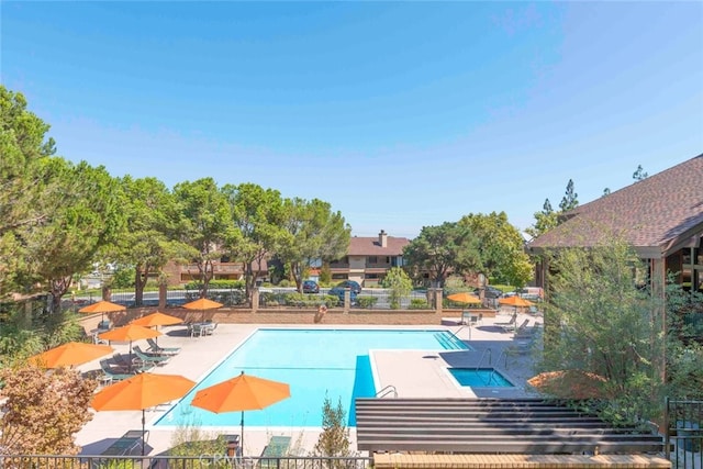 pool featuring a patio area