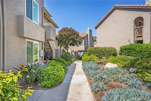 view of property's community featuring stairway