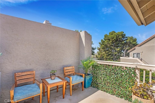 balcony featuring a patio area