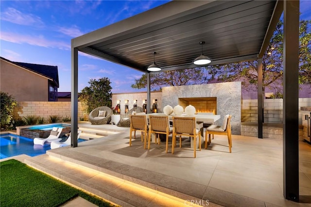 27780 Reel Ln, Valencia, CA 91381 - view of patio / terrace with a hot tub, a fenced backyard, a fenced in pool, a lit fireplace, and outdoor dining area