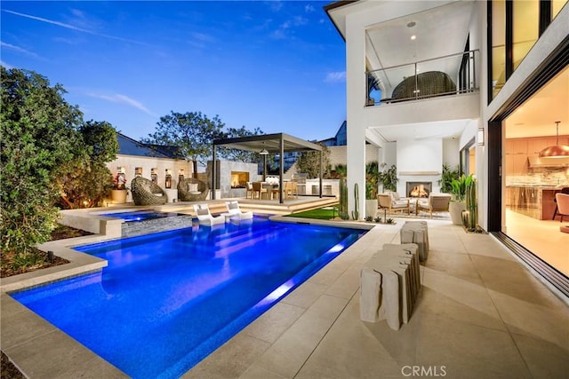 27780 Reel Ln, Valencia, CA 91381 - outdoor pool featuring an in ground hot tub, area for grilling, a patio, and a large fireplace