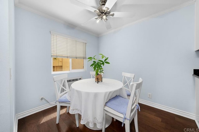 dining space featuring ceiling fan, wood finished floors, baseboards, and ornamental molding