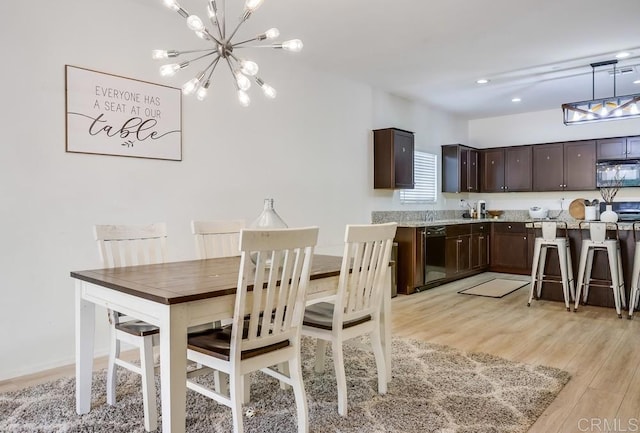 26841 Franklin Ave, Winchester, CA 92596 - dining area with an inviting chandelier and light wood-type flooring