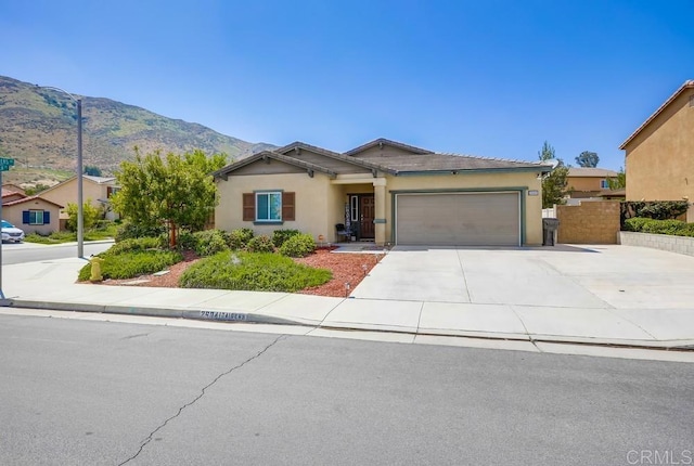 26841 Franklin Ave, Winchester, CA 92596 - single story home with a garage, stucco siding, a mountain view, and driveway