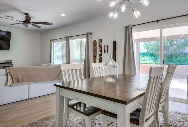 26841 Franklin Ave, Winchester, CA 92596 - dining room with visible vents, light wood-style flooring, ceiling fan with notable chandelier, and recessed lighting