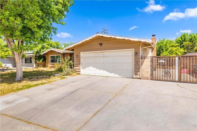 single story home with a gate, a garage, a chimney, fence, and driveway