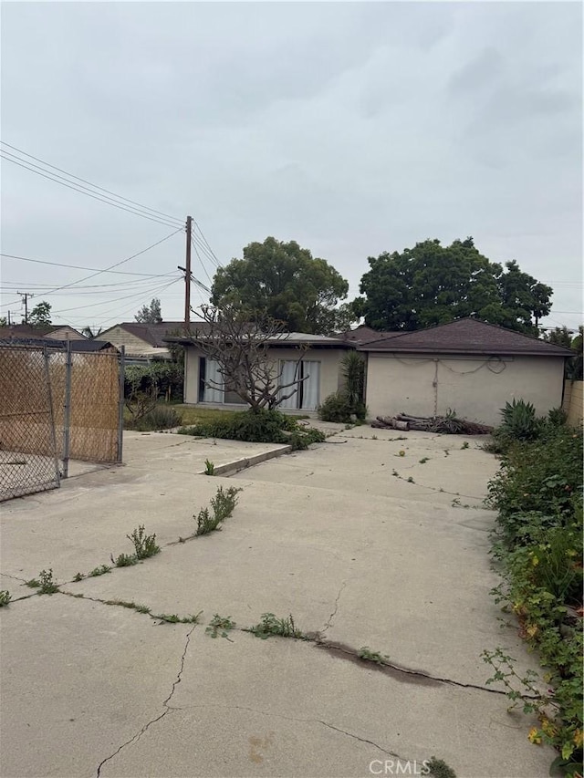 3754 Grace Ave, Baldwin Park, CA 91706 - view of front facade with fence and concrete driveway
