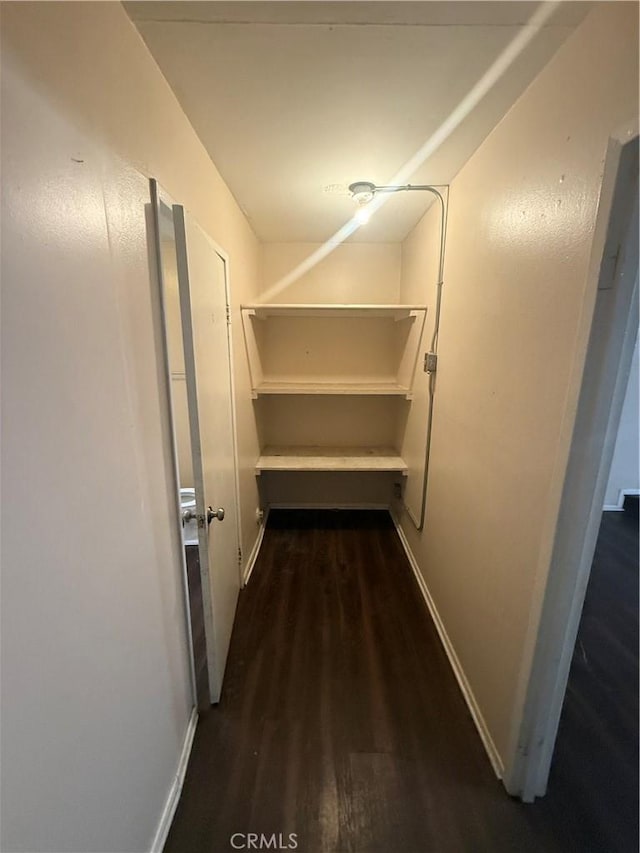 3754 Grace Ave, Baldwin Park, CA 91706 - interior space with baseboards and dark wood-style flooring