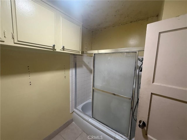 3754 Grace Ave, Baldwin Park, CA 91706 - full bath with tile patterned floors, baseboards, and combined bath / shower with glass door