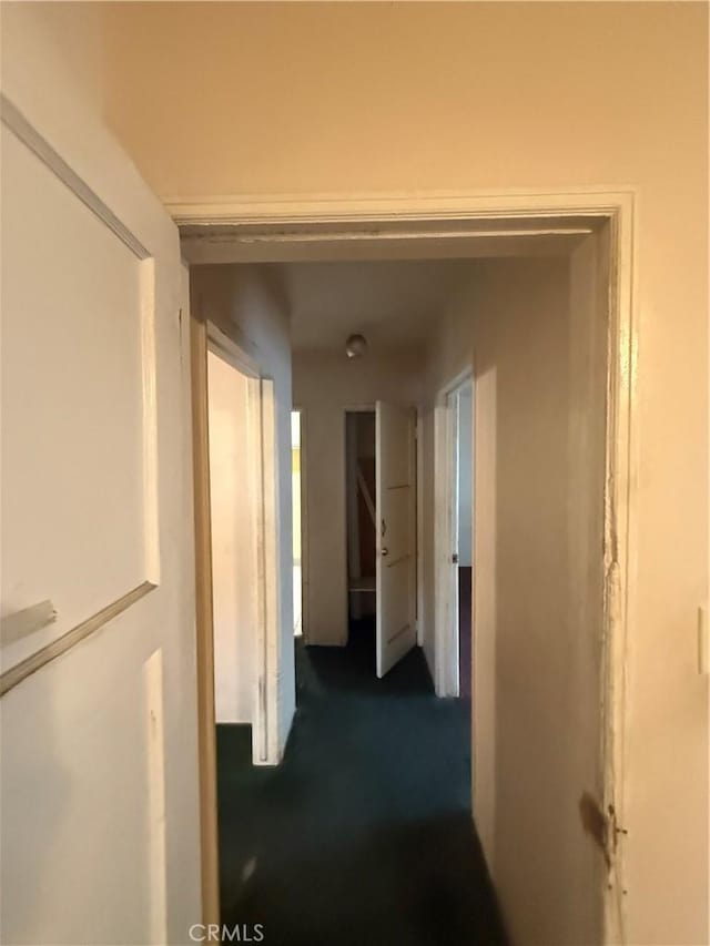 3754 Grace Ave, Baldwin Park, CA 91706 - hallway featuring dark colored carpet