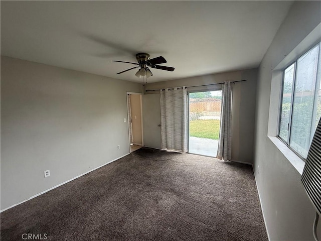 3754 Grace Ave, Baldwin Park, CA 91706 - unfurnished room with plenty of natural light, dark colored carpet, baseboards, and ceiling fan