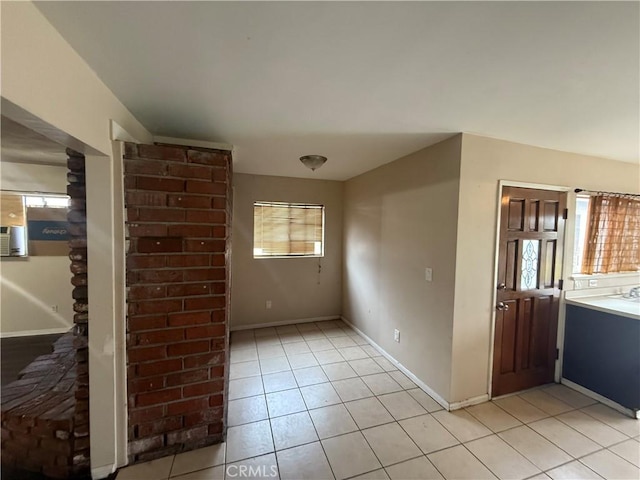 3754 Grace Ave, Baldwin Park, CA 91706 - empty room with light tile patterned floors and baseboards