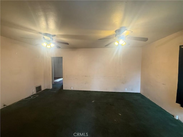 3754 Grace Ave, Baldwin Park, CA 91706 - unfurnished room with dark carpet, visible vents, and ceiling fan