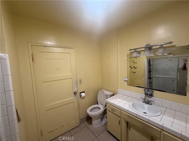 3754 Grace Ave, Baldwin Park, CA 91706 - bathroom with toilet, tile patterned floors, and vanity