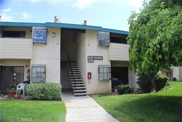 view of building exterior with stairway