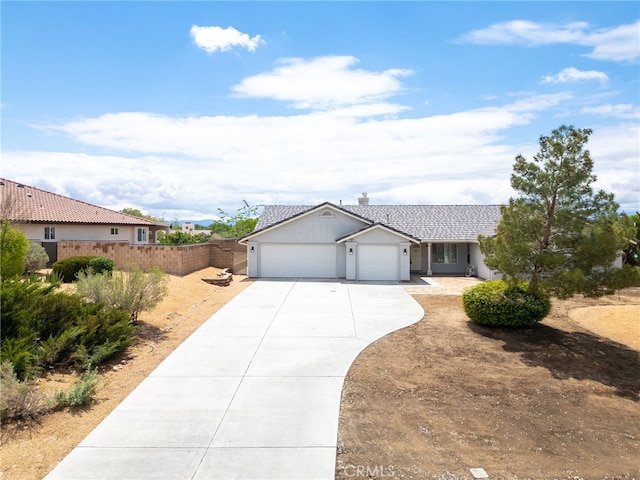 13912 Riverside Dr, Apple Valley, CA 92307 - ranch-style home featuring a chimney, driveway, fence, an attached garage, and stucco siding