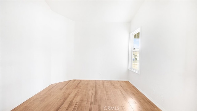 13912 Riverside Dr, Apple Valley, CA 92307 - empty room featuring baseboards and light wood-style floors