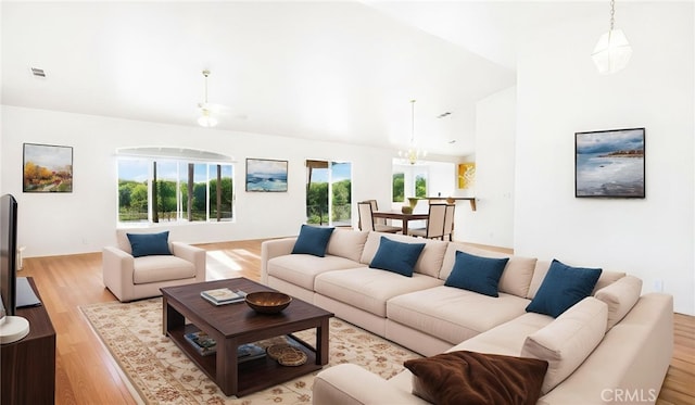 13912 Riverside Dr, Apple Valley, CA 92307 - living room featuring a wealth of natural light, light wood finished floors, and visible vents