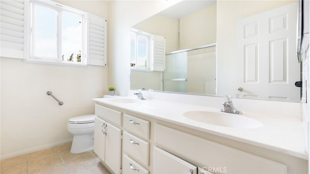 13912 Riverside Dr, Apple Valley, CA 92307 - full bath featuring a shower with door, toilet, baseboards, a sink, and double vanity
